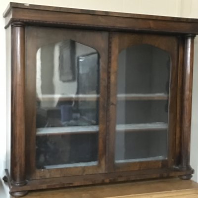 A mahogany display cabinet