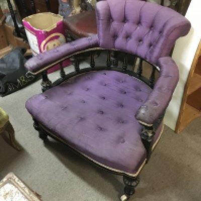 A Victorian open arm chair with lavender upholstery and ebonize wood body. width 75cm height 75cm