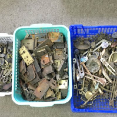 A collection of assorted locks key covers and handles.