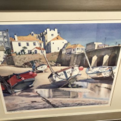 A limited edition print of harbour in st Ives by N Tilley.