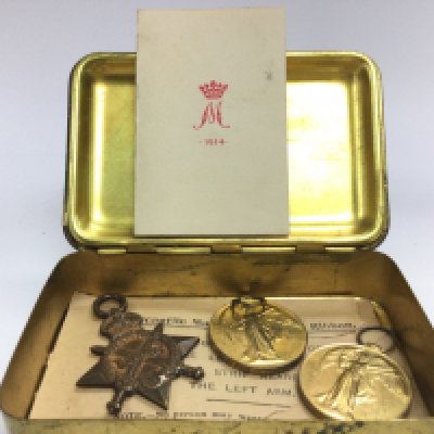 A family group of World War One medals including a 1914-15 star with a Christmas tin and card. Medal recipients consist of PTE. W. ASHLEY. R.W.KENT.R, PTE.J.ASHLEY A.S.C, PTE.W.ASHLEY.R.W.KENT R.