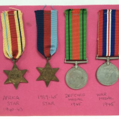 World War Two medals including an African Star, 1939-45 star, Defence and war medals. Postage category A