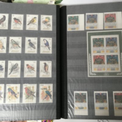 Five albums containing Commonwealth stamps Bermuda St Vincent Aitutaki Cook Islands all unused stamps of the second quarter of the 20th century well presented some albums half full and one other album of used world stamps (6)