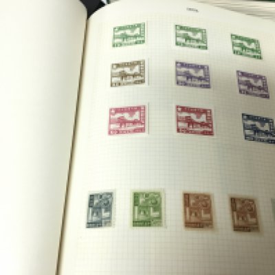 A collection of five green The Viking stamp albums containing world stamps used and unused mainly second half of the 20th century a d four other stamp albums (9)