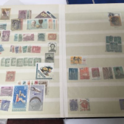 An album containing a collection of world stamps including a few Victorian stamps Queensland and South Wales Australia. Other world stamps from the late 19th century onwards all used and well presented two other half filled albums of world stamps and an album of unused British Pictorial Decimal Stamps. (4)