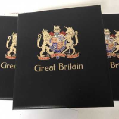 Three Great Britain albums containing Elizebeth II and other stamps. Including some unused high value stamps.