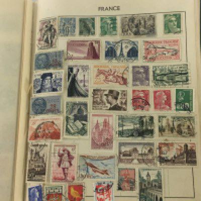 A stamp stock book containing world stamps.