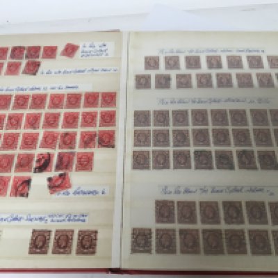 A well presented album of used stamps Predominantly George V and George VI in a red album.