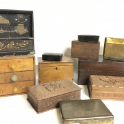 Vintage boxes including wooden and brass examples.