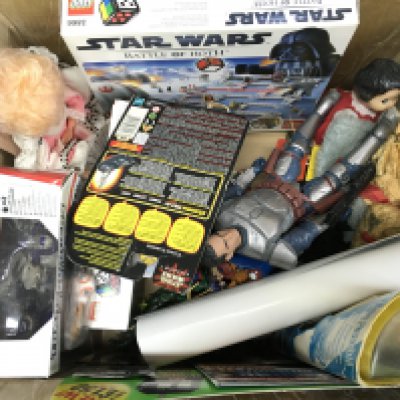 An assortment of toys including star wars, doctor who, transformers, lego etc