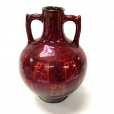 A Pilkingtons red lustre pottery vase, some damage to handle. (D). NO RESERVE
