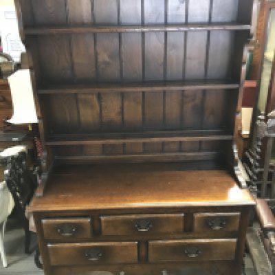A reproduction 18th century style oak dresser , dimensions 45x106x193cm