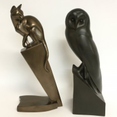 Two cast resin figures, owl and a cat. Approximately 40cm tall. This lot cannot be posted. NO RESERVE