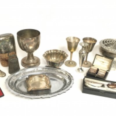A collection of silver plate including a novelty boot, trays, glasses, spoons, napkin rings. Postage category C. NO RESERVE