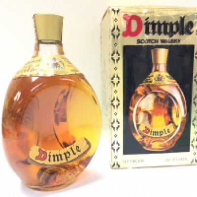 A boxed bottle of Dimple Scotch Whisky , postage category D. NO RESERVE
