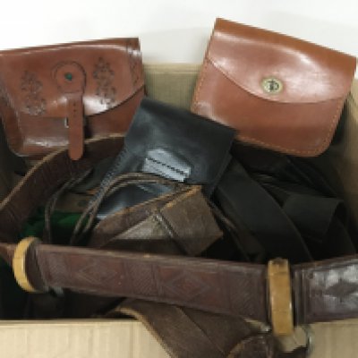 A box containing a quantity of Military and other leather belts and bags and buckles. NO RESERVE