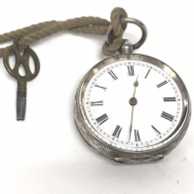 A silver pocket watch. Winds and runs. Approx 36mm case. Postage B- NO RESERVE