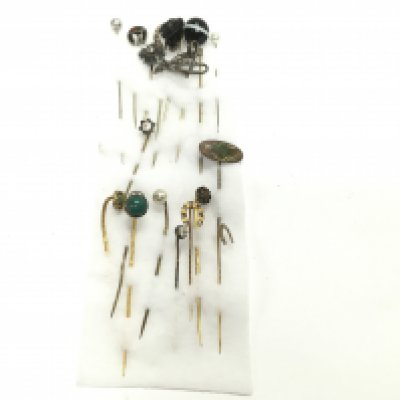 A collection of assorted stick pins including 9ct gold examples. Postage A