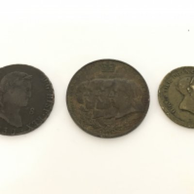 Three bronze coins including a Spanish 1830 Ferdinand VII Maravedis, Four generations of the British royal family coin 1897 and The Death of Princess Charlotte 1817 coin. Postage category A- NO RESERVE