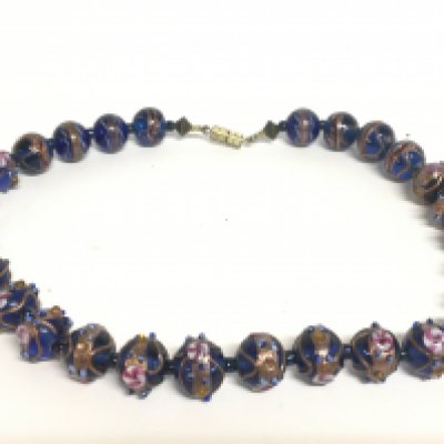 A Venetian Murano Millefiore overlaid glass bead necklace. Postage category A- NO RESERVE