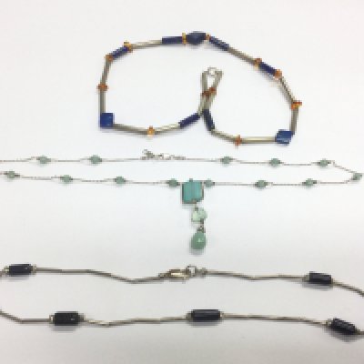 Three silver necklaces set with semi precious stones. Shipping category A.- NO RESERVE