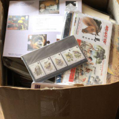 A box containing a large quantity of world stamps mainly second half of the 20th century unused stamps covers etc. NO RESERVE