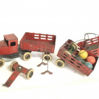 A vintage tin plate toy truck with extras. This lot cannot be posted- NO RESERVE