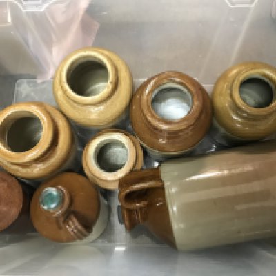 Five boxes containing vintage bottles of various shapes and sizes, including earthenware bottles, Ho water pots and large jars including Pewter jugs