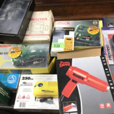 A collection of power tools including hot air gun a router and jigsaw etc. Postage D