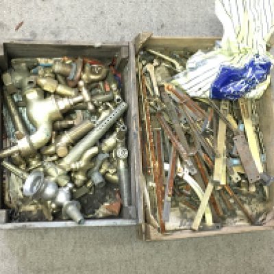 A collection of vintage door locks and various taps.