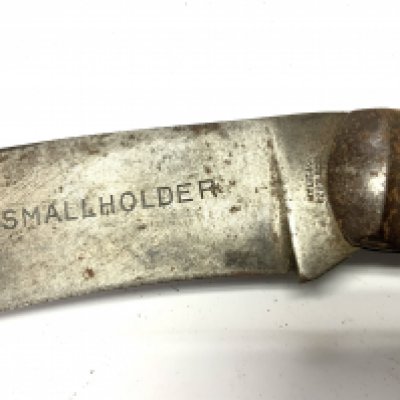 A large Antler bodies folding knife, marked Wylie & Co. 15.5cm (A). Engraved to blade presented to the smallholder (D)