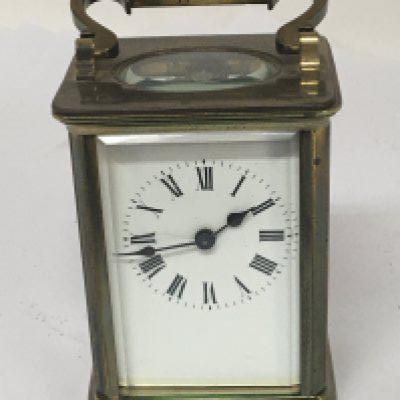 A brass cased carriage CVL with key and seen working.