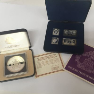 A cased Silver Ten dollar Bahamas 1978 coin and a cased set of four silver stamps (2)