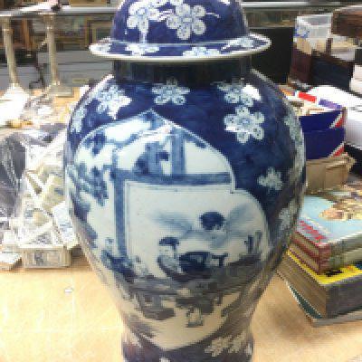A large blue and white vase and cover decorated with figures, approx height 48cm. Shipping category D.