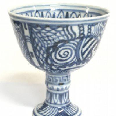 A Chinese blue and white high stand cup , 9cm tall. No obvious damage or restoration. This lot cannot be posted