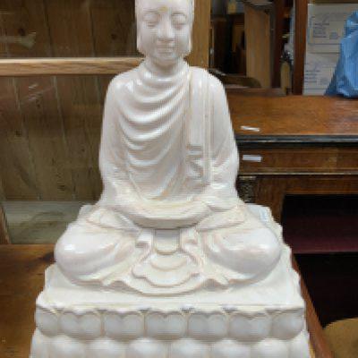 A large modern ceramic figure of Buddha. 54cm x 41cm x 32cm