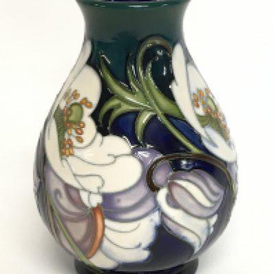 A Moorcroft trial vase, 14cm tall. No obvious damage or restoration, this lot cannot be posted.