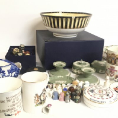A collection of porcelain Items including Wedgwood, thimbles, coronation ware, a boxed Worcester bowl
