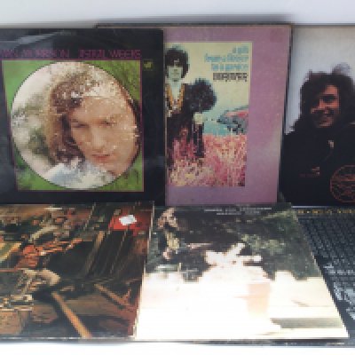 Two bags containing 12 folk rock LPs by various artists including Bob Dylan, Donovan, Quicksilver Messenger Service and others.