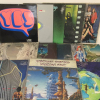 Two bags containing 13 Yes and related LPs including foreign pressings.