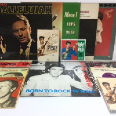 A collection of LPs, CDs and DVDs relating to Marty Wilde, Karl Denver and Lonnie Donegan. Includes a signed Marty Wilde DVD.