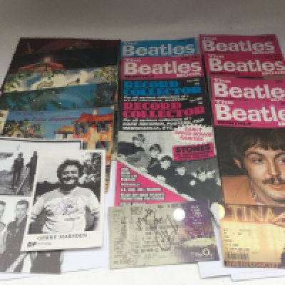 A box of music memorabilia including Beatles Monthly books, Fonoscope musical postcards, a signed Gerry Marsden publicity card, music books etc.