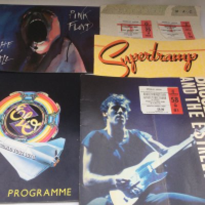 A collection of concert programs and tickets including Bruce Springsteen, Fleetwood Mac and others plus a Genesis press pack and fanzines plus some theatre and football programs.