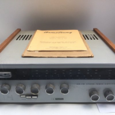 An Armstrong T26 amplifier with manual.