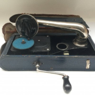 A 1930s Thorens Excelda portable gramophone.