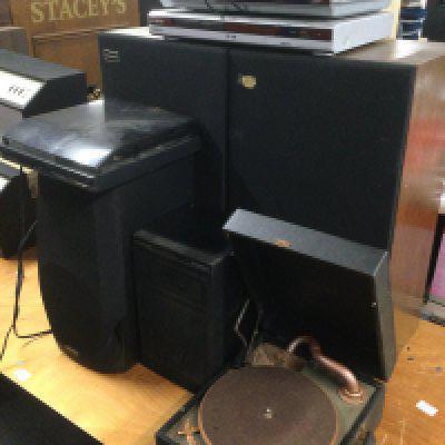 A collection of audio visual equipment comprising a pair of floorstanding Sanyo speakers, a Kenwood record player, a Brunswick gramophone, two DVD players etc.