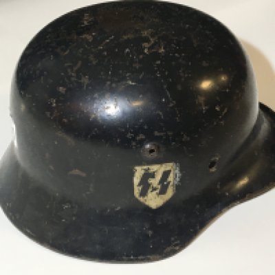 A German Third Reich II world war SS helmet M35 pattern with SS decal no inner liner.