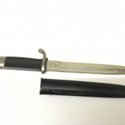 A German II world war Third Reich K98 pattern dress bayonet nice condition the blade with makers stamp Carl Julius. Solingen. With metal scabbard. 35cm
