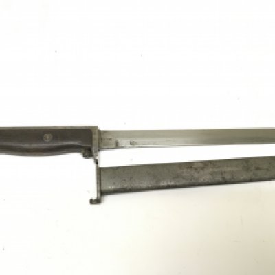 A Norwegian bayonet M 1912 with wooden grip press button release the blade with makers marks and matching serial number on the metal scabbard.