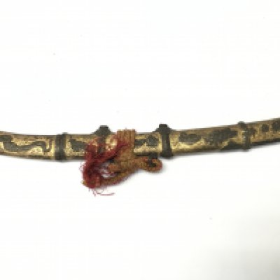 A possibly Chinese dagger with dragon and peacock design applied to the hilt and Scabbard , blade 20cm long , total length 32cm long.